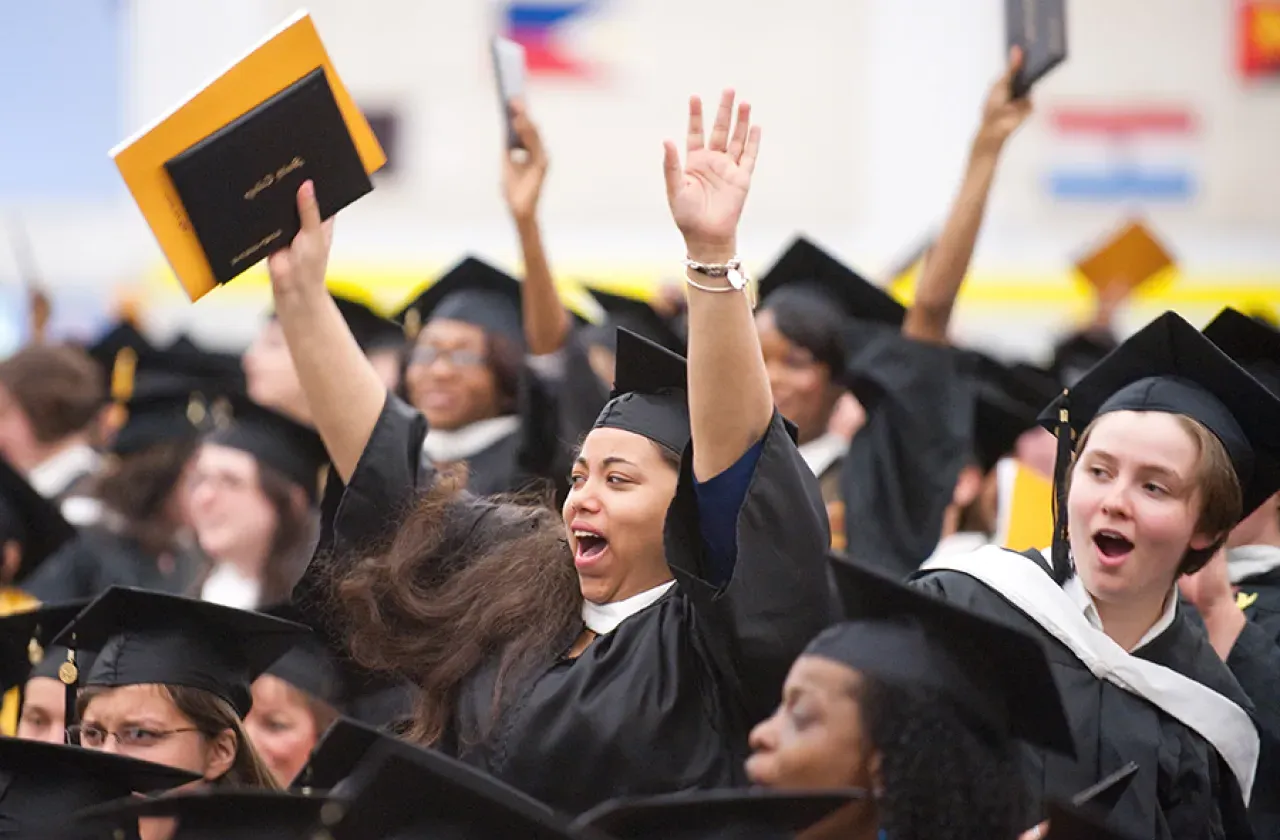 A crowd of students at Commencement